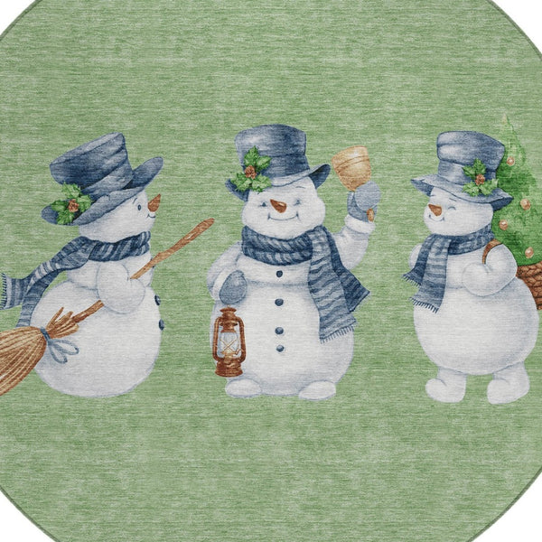 HomeRoots 8' Washable Round Area Rug with Snowmen Motif in Artichoke Green, Denim Blue & Ivory for Indoors & Outdoors 621738