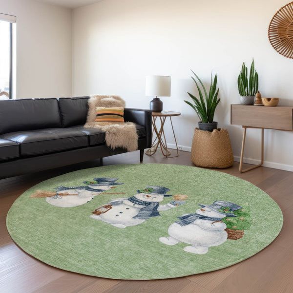 HomeRoots 8' Washable Round Area Rug with Snowmen Motif in Artichoke Green, Denim Blue & Ivory for Indoors & Outdoors 621738