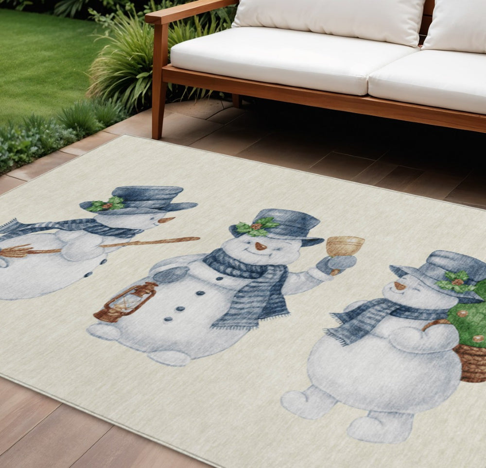 HomeRoots 10' X 14' Snowmen Area Rug - Washable Ivory & Denim Blue Design for Indoor/Outdoor Spaces, Durable & Cozy 621765