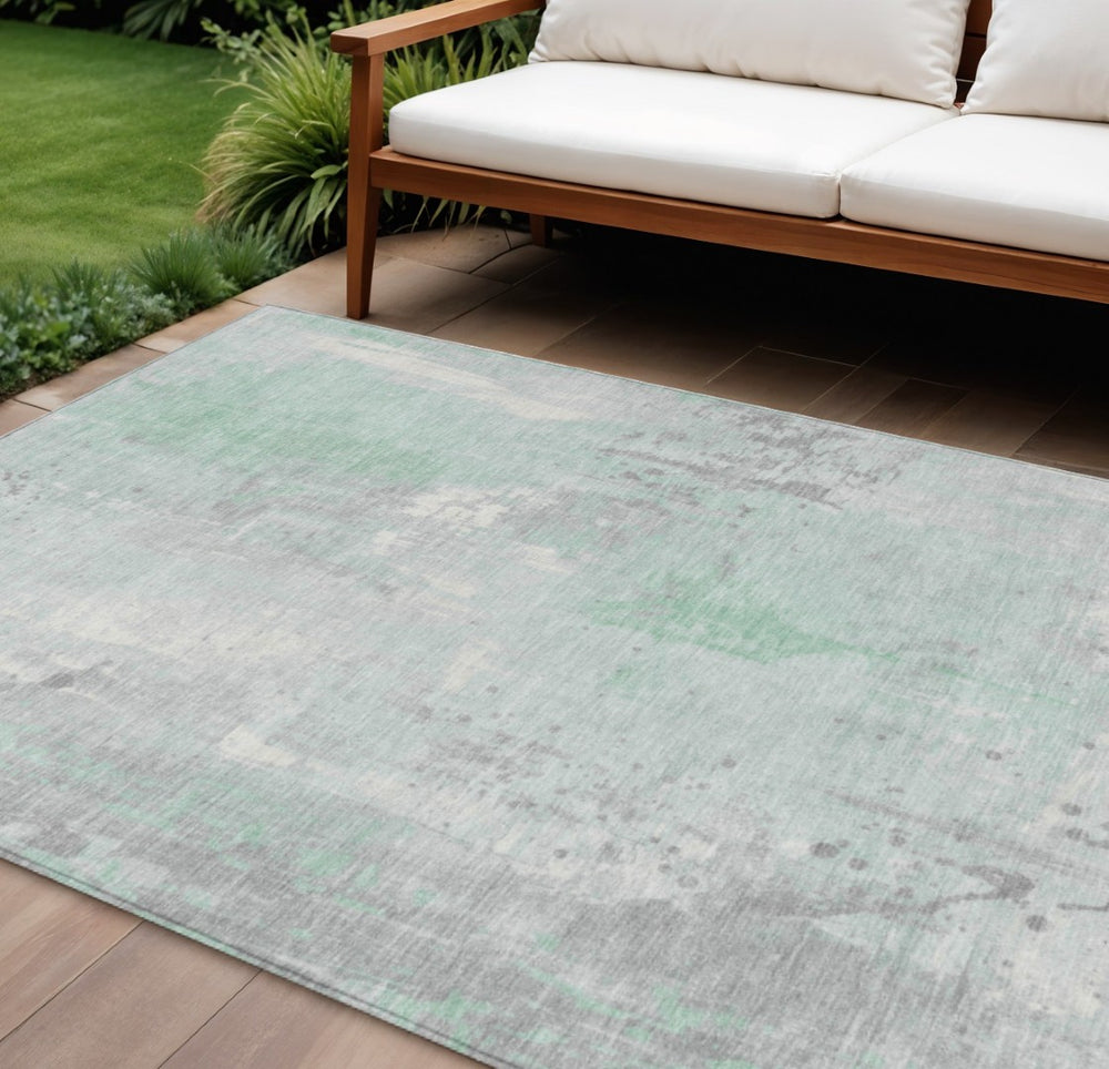 HomeRoots 10' Mint Green and Ivory Abstract Washable Area Rug – Durable, Versatile Design for Indoor & Outdoor Spaces 622389