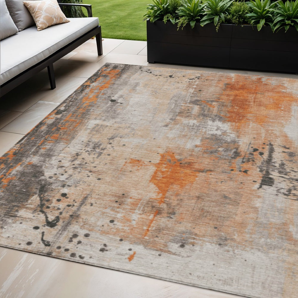 HomeRoots 5' Orange and Gray Abstract Area Rug - Washable, Durable, Modern Design for Indoor/Outdoor Use 622391