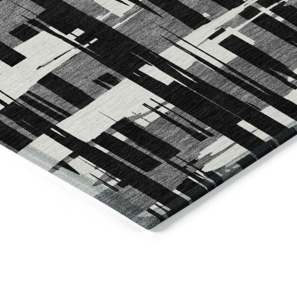 HomeRoots 5' Stylish Black, Gray, and Ivory Striped Washable Indoor-Outdoor Area Rug for Versatile Living Spaces 8' Round 622679