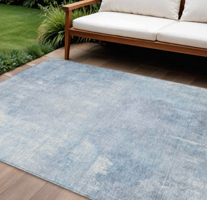 HomeRoots 5' Stylish Sky Blue and Ivory Abstract Washable Area Rug for Indoor & Outdoor High-Traffic Spaces 9' X 12' 622831