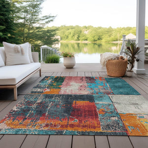 HomeRoots 5' Teal Blue and Orange Abstract Area Rug – Vibrant, Washable, Indoor/Outdoor, Stain-Resistant Design 5' X 8' 623265