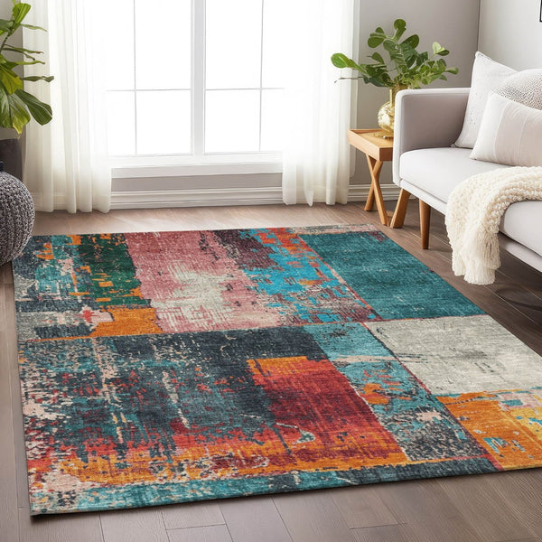 HomeRoots 5' Teal Blue and Orange Abstract Area Rug – Vibrant, Washable, Indoor/Outdoor, Stain-Resistant Design 5' X 8' 623265