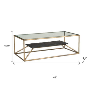 HomeRoots 48" Brass Glass and Iron Pedestal Coffee Table - Elegant Centerpiece for Modern Living Spaces & Offices 623341