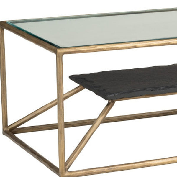 HomeRoots 48" Brass Glass and Iron Pedestal Coffee Table - Elegant Centerpiece for Modern Living Spaces & Offices 623341