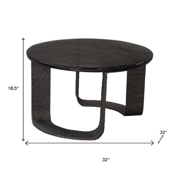 HomeRoots 32" Black Glass Coffee Table - Modern Round Pedestal Design for Living Room & Office Elegance 623348