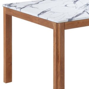 HomeRoots 63" White Wood Dining Table - Solid Wood Elegance for Dining, Entertaining, and Home Workspaces 623357