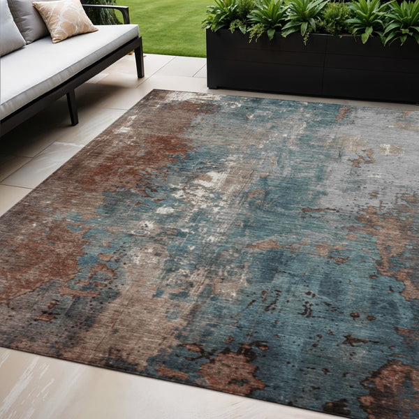 HomeRoots 5' Abstract Rust and Teal Blue Area Rug - Washable, Versatile Indoor/Outdoor Design for Modern Spaces 5' X 8' 623432