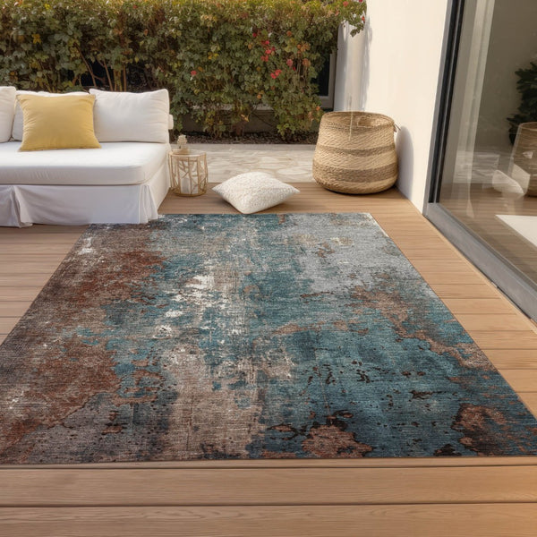 HomeRoots 5' Abstract Rust and Teal Blue Area Rug - Washable, Versatile Indoor/Outdoor Design for Modern Spaces 5' X 8' 623432