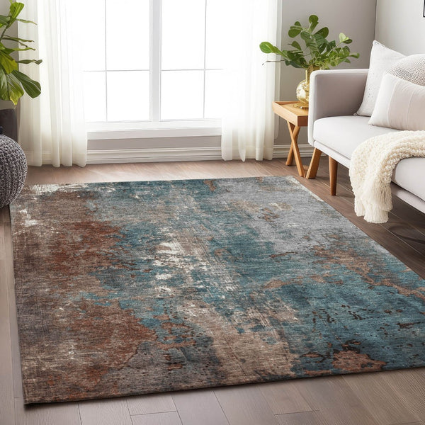 HomeRoots 5' Abstract Rust and Teal Blue Area Rug - Washable, Versatile Indoor/Outdoor Design for Modern Spaces 8' X 10' 623434