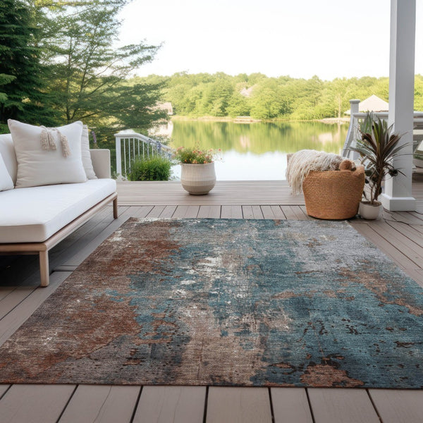 HomeRoots 5' Abstract Rust and Teal Blue Area Rug - Washable, Versatile Indoor/Outdoor Design for Modern Spaces 10' X 14' 623436