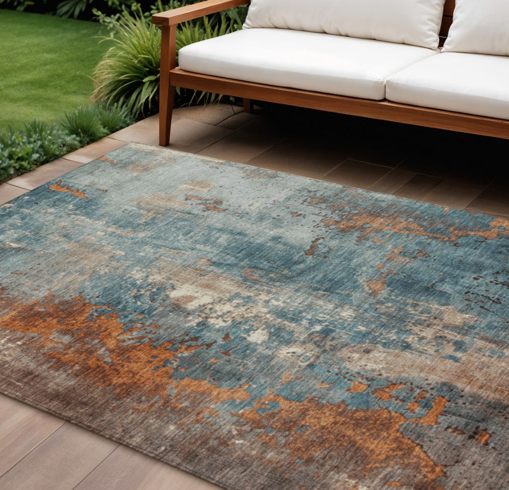 HomeRoots 5' Teal Blue and Copper Abstract Area Rug - Stylish, Washable, Durable Indoor/Outdoor Accent Piece 9' X 12' 623441