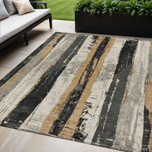 HomeRoots 5' Stylish Taupe and Gold Striped Washable Area Rug for Indoor and Outdoor High-Traffic Spaces 5' X 8' 623504