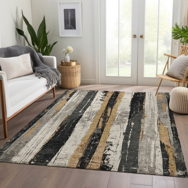 HomeRoots 5' Stylish Taupe and Gold Striped Washable Area Rug for Indoor and Outdoor High-Traffic Spaces 5' X 8' 623504