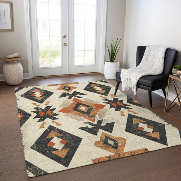 HomeRoots 5' X 8' Aztec Area Rug - Vibrant Ivory, Orange & Charcoal, Machine-Washable, Indoor/Outdoor Use 623864