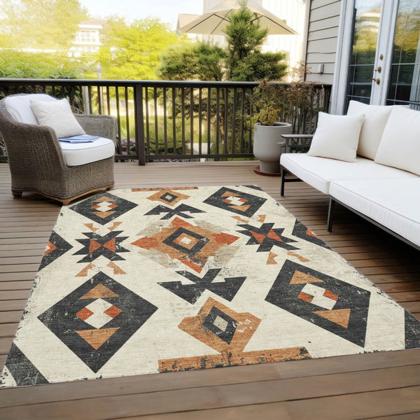 HomeRoots 5' X 8' Aztec Area Rug - Vibrant Ivory, Orange & Charcoal, Machine-Washable, Indoor/Outdoor Use 623864