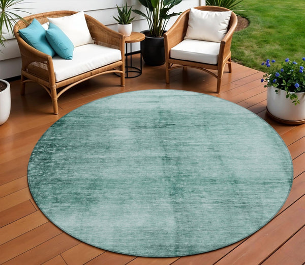 HomeRoots 8' Teal Blue and Ivory Round Abstract Area Rug - Washable, Durable for Indoor Outdoor Spaces 623961