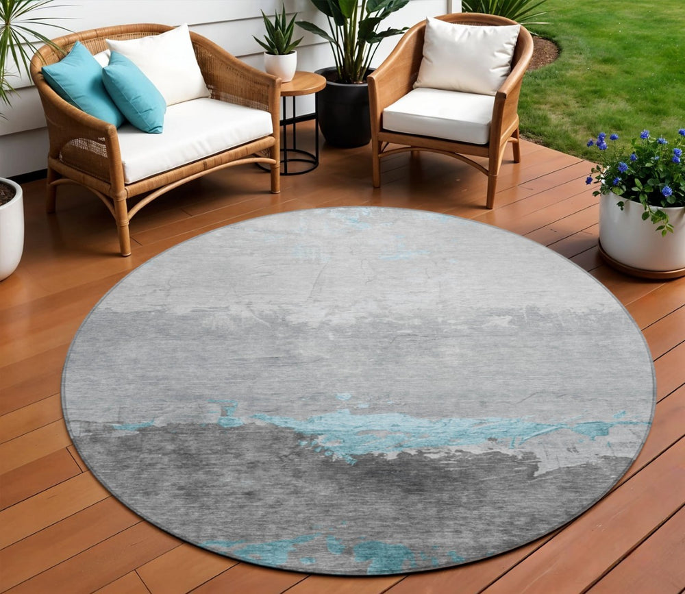 HomeRoots 8' Teal Blue and Gray Round Abstract Area Rug - Stylish, Washable, Indoor/Outdoor Design for All Spaces 623991