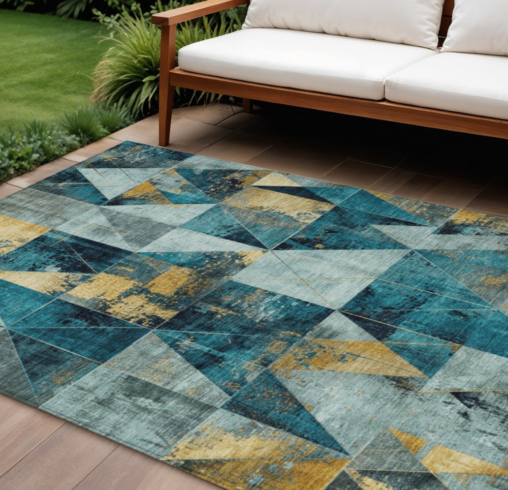 HomeRoots 10' Teal Blue and Gold Geometric Indoor Outdoor Area Rug - Soft, Durable, Machine Washable Design 624078