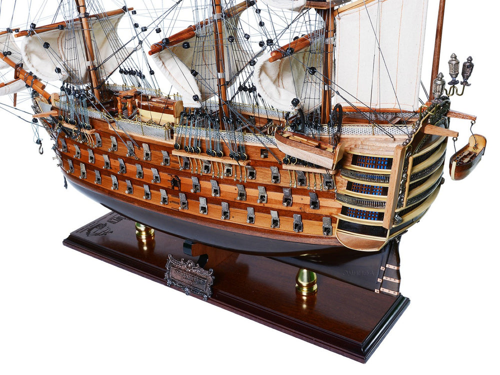 HomeRoots 27" Vintage-Inspired Hand-Painted Wooden Model Boat - Artisan Craftsmanship for Coastal Décor 624631