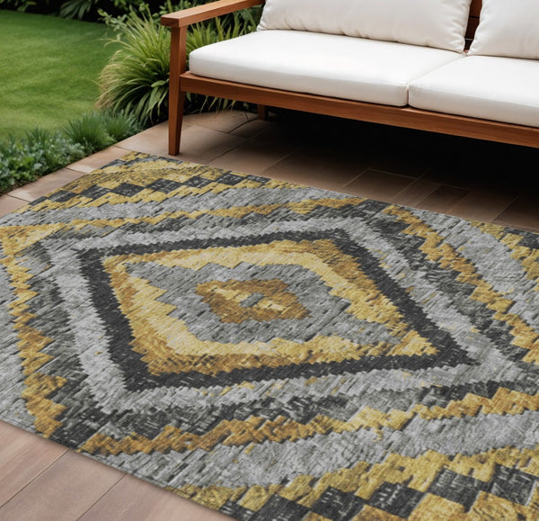 HomeRoots 9' X 12' Gold and Gray Aztec Area Rug - Durable, Washable Design Perfect for Indoor and Outdoor Use 624753