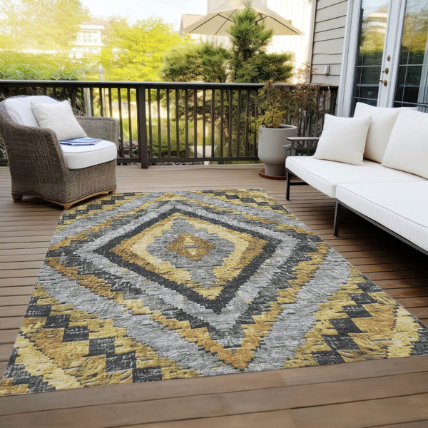 HomeRoots 9' X 12' Gold and Gray Aztec Area Rug - Durable, Washable Design Perfect for Indoor and Outdoor Use 624753