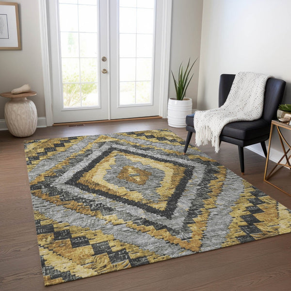 HomeRoots 10' X 14' Gold and Gray Aztec Rug – Stylish, Washable Area Rug for Indoor & Outdoor Spaces 624754