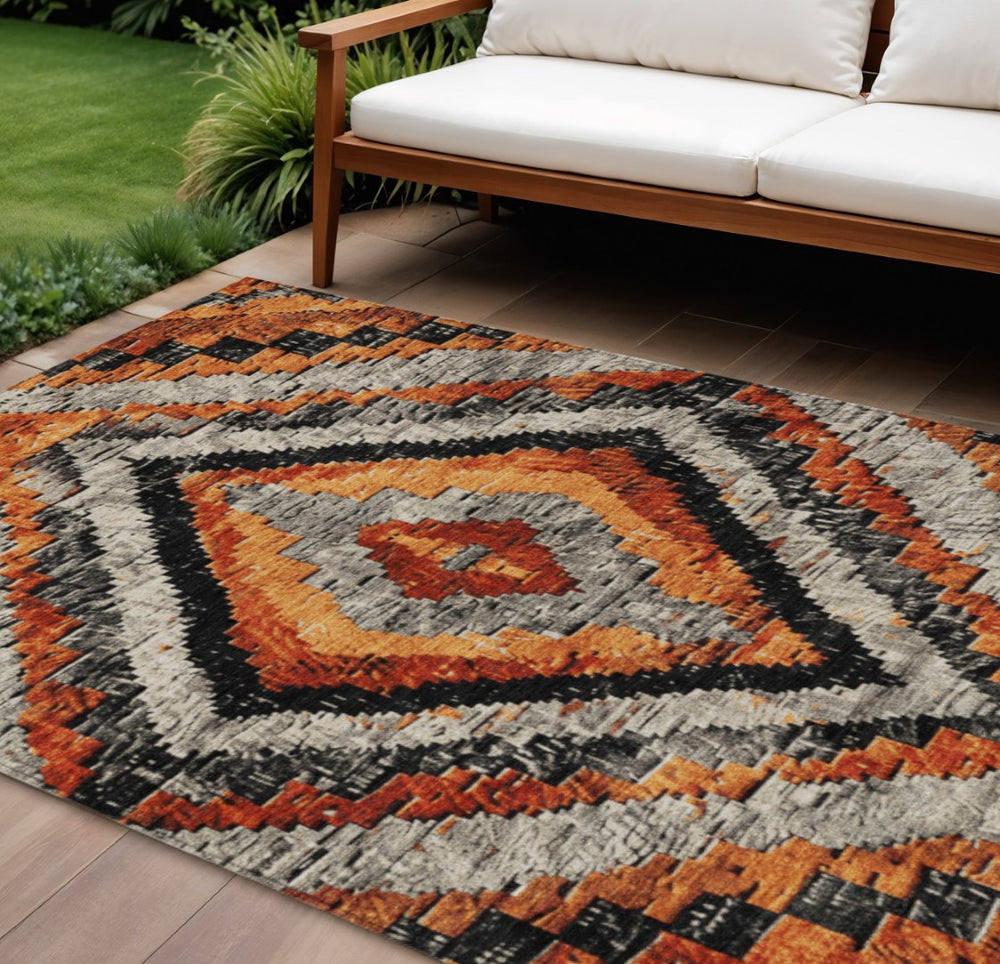 HomeRoots 10' Stylish Terra Cotta & Gray Aztec Washable Area Rug - Perfect for Indoor/Outdoor Spaces! 624784