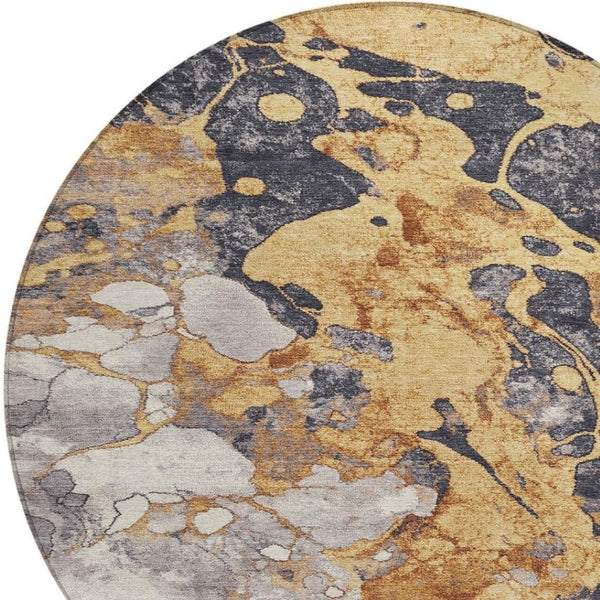 HomeRoots 8' Gold and Charcoal Round Modern Abstract Indoor-Outdoor Area Rug - Durable, Washable, Stylish! 625477