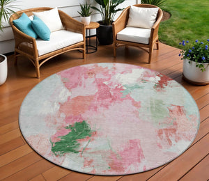 HomeRoots 8' Blush and Green Round Abstract Area Rug - Stylish, Washable, Perfect for Indoor and Outdoor Spaces! 625609