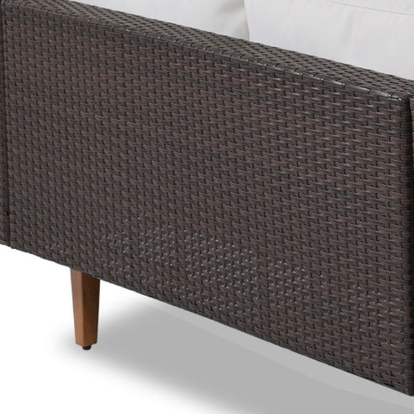 HomeRoots Two Piece Outdoor Wicker Sectional Seating Set with Beige Cushions & Coffee Table for Patios 625675
