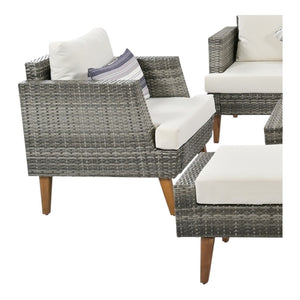 HomeRoots Four-Piece Outdoor Gray Wicker Seating Group with Cushions, Coffee Table & Versatile Comfort Options 625696