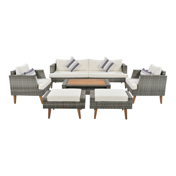 HomeRoots Four-Piece Outdoor Gray Wicker Seating Group with Cushions, Coffee Table & Versatile Comfort Options 625696