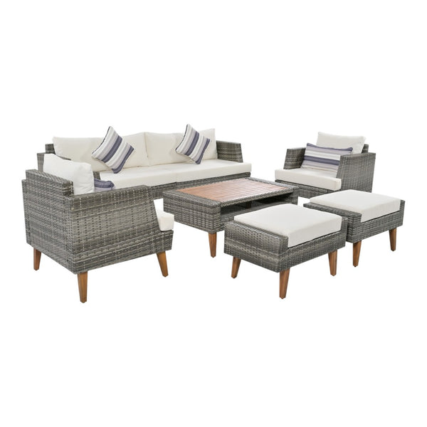 HomeRoots Four-Piece Outdoor Gray Wicker Seating Group with Cushions, Coffee Table & Versatile Comfort Options 625696