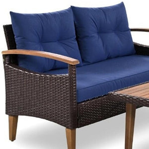 HomeRoots Three-Piece Outdoor Blue Rattan Sofa Set with Cushions & Acacia Coffee Table for Stylish Relaxation 625699