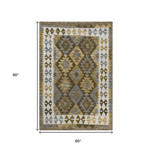 HomeRoots 5' X 8' Brown Ivory Gold Tribal Area Rug – Durable, Washable, Indoor/Outdoor Style for Any Space 625721