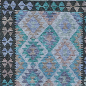 HomeRoots 5' X 8' Tribal Washable Area Rug in Teal Blue, Charcoal & Copper – Perfect for Indoor & Outdoor Use! 625769