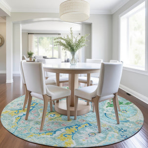 HomeRoots 8' Vibrant Round Floral Area Rug in Teal Blue, Yellow & Green – Washable for Indoor/Outdoor Use 626304