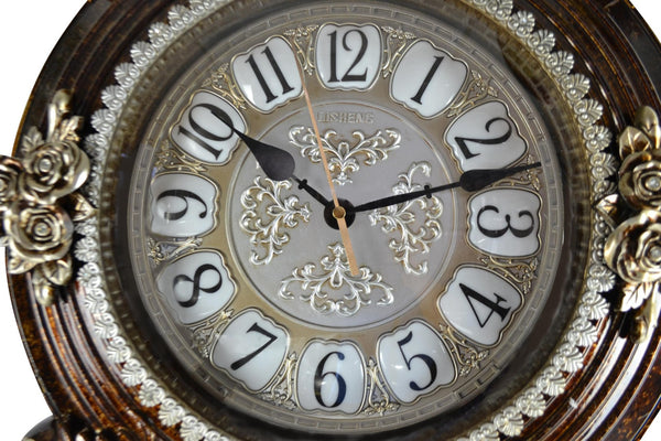 HomeRoots 16" Brown and Silver Resin Wall Clock - Elegant Silent Pendulum with Ornate Floral Design for Home Decor 626385