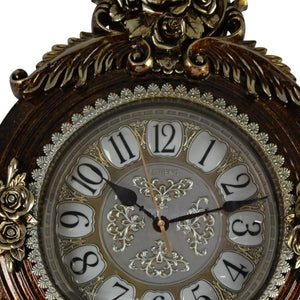 HomeRoots 16" Brown and Silver Resin Wall Clock - Elegant Silent Pendulum with Ornate Floral Design for Home Decor 626385