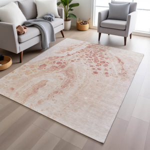 HomeRoots 5' Salmon and Ivory Abstract Washable Area Rug – Durable Indoor/Outdoor Design for Modern Spaces 5' X 8' 626417