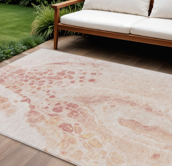 HomeRoots 5' Salmon and Ivory Abstract Washable Area Rug – Durable Indoor/Outdoor Design for Modern Spaces 9' X 12' 626420