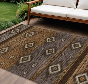 HomeRoots 5' Stylish Chocolate Copper and Gray Tribal Washable Area Rug for Indoor and Outdoor Spaces 8' X 10' 626735