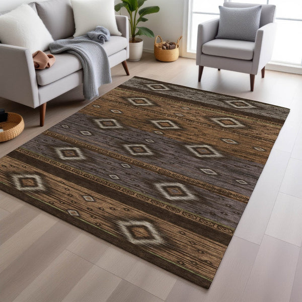 HomeRoots 5' Stylish Chocolate Copper and Gray Tribal Washable Area Rug for Indoor and Outdoor Spaces 9' X 12' 626736