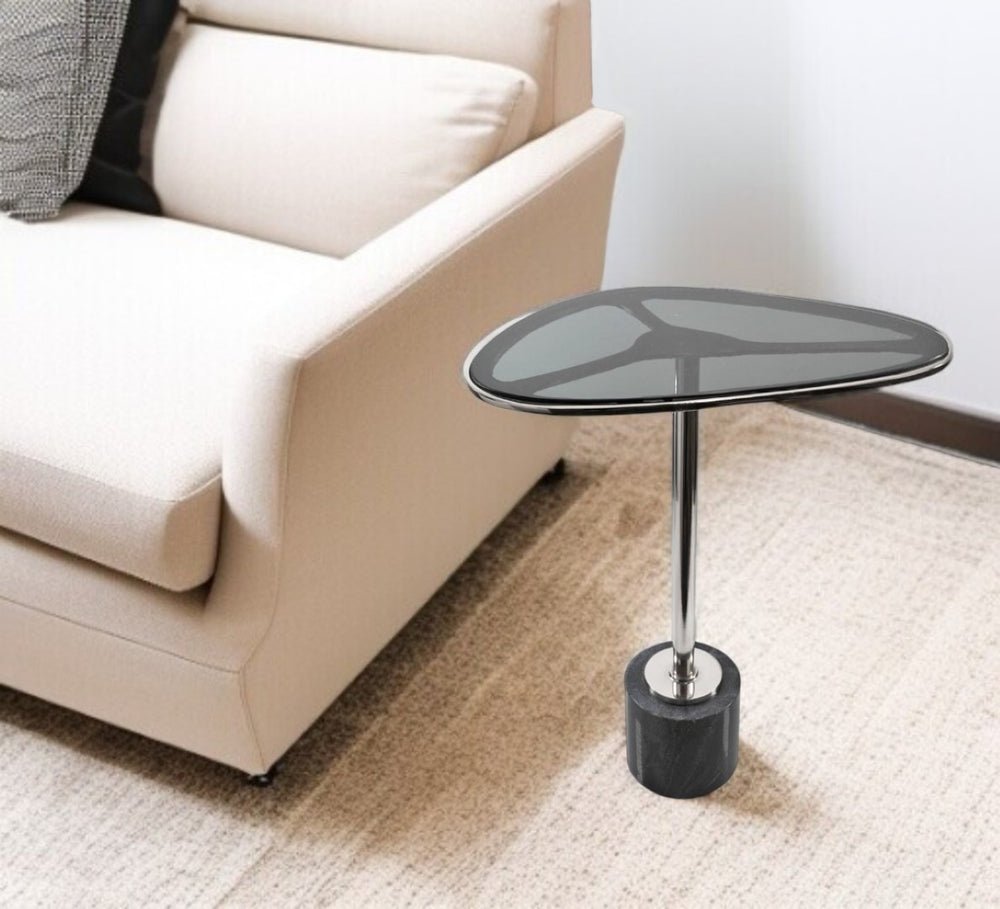 HomeRoots 22" Smoky Black Glass and Silver Aluminum Pedestal End Table with Marble Accent for Modern Living 627516