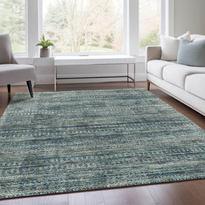 HomeRoots 5' Durable Teal Blue and Ivory Striped Area Rug for Indoor and Outdoor Use - Easy Care, Stylish Design 5' X 8' 627786