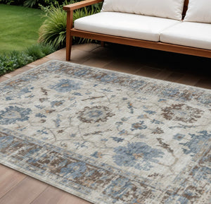 HomeRoots 5' Elegant Beige and Blue Floral Machine-Washable Area Rug for Indoor and Outdoor Spaces 9' X 12' 627891