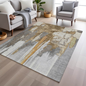 HomeRoots 5' Elegant Ivory and Gold Abstract Area Rug - Durable, Machine Washable for Indoor and Outdoor Use 10' X 14' 627952